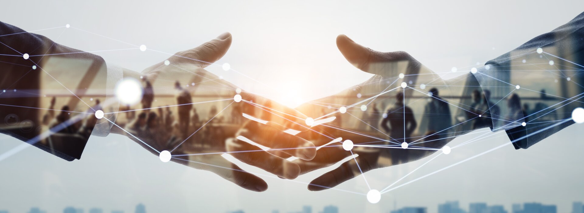 AGENA: Geschäftshandshake mit digitalen Netzwerken